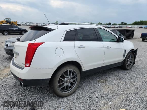 ✅ 2016 Cadillac SRX Premium Collection • VIN: 3GYFNDE39GS546265 • Lot: 65597945. Wystawiony na Copart z przebiegiem 145 591 mil. Bezpłatny archiwum sprzedaży aukcyjnych z USA i szczegółowy raport historii pojazdu na DreamBid. Zdjęcie 3.