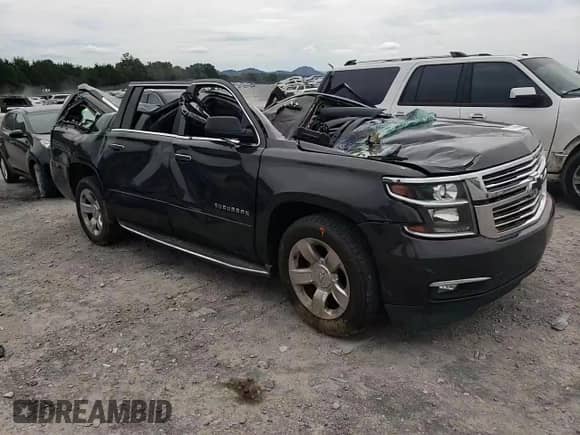 2017 Chevrolet Suburban Premier z VIN 1GNSCJKC7HR123032, wystawiony jako Copart lot #70243104 z przebiegiem Nie podano mil oraz Szkoda całkowita • Salvage title. Historia ofert i sprzedaży dostępna na DreamBid. Obrazek 12.