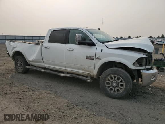 ✅ 2018 Ram 3500 Laramie • VIN: 3C63R3JL5JG385685 • Lot: 71718145. Wystawiony na Copart z przebiegiem 98 330 mil. Bezpłatny archiwum sprzedaży aukcyjnych z USA i szczegółowy raport historii pojazdu na DreamBid. Zdjęcie 4.
