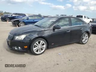 ✅ 2014 Chevrolet Cruze LTZ • VIN: 1G1PG5SB6E7431536 • Lot: 82635945. Listed on Copart with 80,618 mi. Free auction sales archive from the USA and detailed vehicle history report at DreamBid. Image 1.