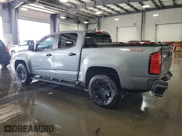 ✅ 2021 Chevrolet Colorado 4WD Z71 • VIN: 1GCGTDEN0M1130524 • Лот: 59906174. Опубликован ранее на Copart с пробегом 74 107 миль. Бесплатный доступ к архиву аукционных продаж из США и подробный отчёт об истории автомобиля на DreamBid. Изображение 2.