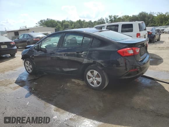 ✅ 2018 Chevrolet Cruze LS • VIN: 1G1BC5SMXJ7213696 • Lot: 47322473. Listed on Copart with 87,917 mi. Free auction sales archive from the USA and detailed vehicle history report at DreamBid. Image 2.