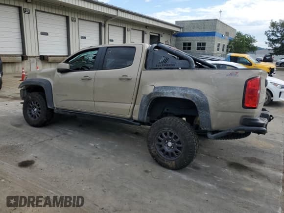 ✅ 2021 Chevrolet Colorado 4WD ZR2 • VIN: 1GCGTEEN8M1268561 • Лот: 67517314. Опубликован ранее на Copart с пробегом 67 889 миль. Бесплатный доступ к архиву аукционных продаж из США и подробный отчёт об истории автомобиля на DreamBid. Изображение 2.