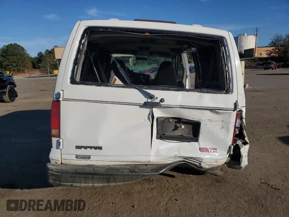 ✅ 2003 GMC Safari • VIN: 1GKDM19X93B516849 • Lot: 82296404. Listed on Copart with Not provided. Free auction sales archive from the USA and detailed vehicle history report at DreamBid. Image 6.