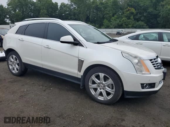 ✅ 2016 Cadillac SRX Premium Collection • VIN: 3GYFNDE34GS547419 • Lot: 69246505. Wystawiony na Copart z przebiegiem 83 142 mil. Bezpłatny archiwum sprzedaży aukcyjnych z USA i szczegółowy raport historii pojazdu na DreamBid. Zdjęcie 4.