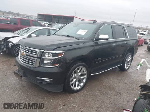 2020 Chevrolet Tahoe Premier z VIN 1GNSKCKC9LR138669, wystawiony jako IAAI lot #40800766 z przebiegiem 51 448 mil mil oraz . Historia ofert i sprzedaży dostępna na DreamBid. Obrazek 2.