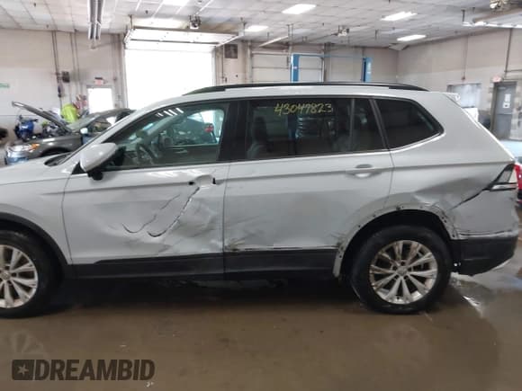 ✅ 2018 Volkswagen Tiguan S • VIN: 3VV0B7AX5JM108371 • Lot: 43047823. Listed on IAAI with 80,531 mi. Free auction sales archive from the USA and detailed vehicle history report at DreamBid. Image 6.