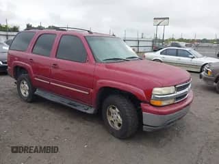 2005 Chevrolet Tahoe LT with VIN 1GNEC13T25R160383, listed as a IAAI auction lot 43083033 with 219,682 mi miles and . Bid and sale history available at DreamBid. Image 1.