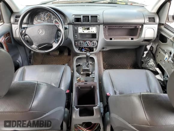 ✅ 1999 Mercedes-Benz M 320/430/500 • VIN: 4JGAB54E0XA114694 • Lot: 71780835. Listed on Copart with 187,841 mi. Free auction sales archive from the USA and detailed vehicle history report at DreamBid. Image 8.