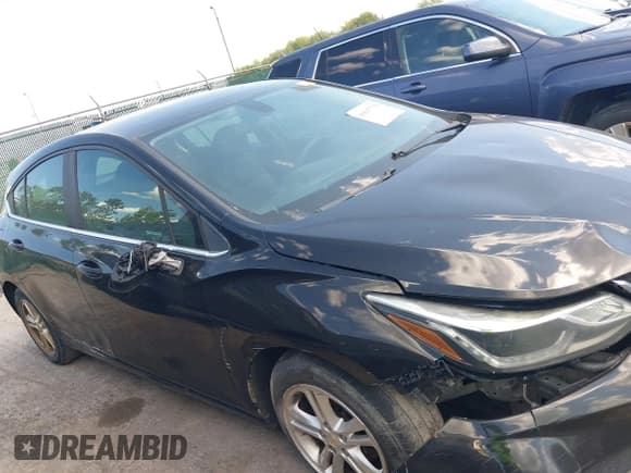 ✅ 2018 Chevrolet Cruze LT • VIN: 3G1BE6SM8JS530927 • Lot: 43137779. Listed on IAAI with 155,527 mi. Free auction sales archive from the USA and detailed vehicle history report at DreamBid. Image 13.