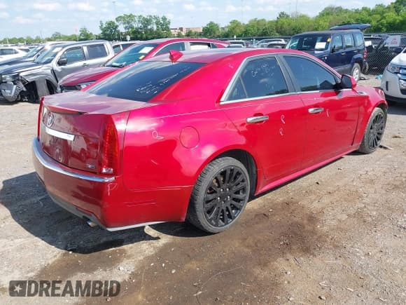 ✅ 2010 Cadillac CTS Performance • VIN: 1G6DK5EV5A0113007 • Lot: 42065282. Listed on IAAI with 228,694 mi. Free auction sales archive from the USA and detailed vehicle history report at DreamBid. Image 4.