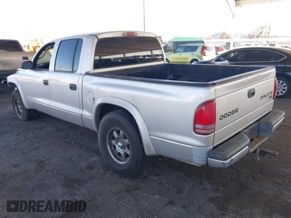 ✅ 2003 Dodge Dakota SLT • VIN: 1D7HL48N13S294573 • Lot: 41291127. Wystawiony na IAAI z przebiegiem 227 355 mil. Bezpłatny archiwum sprzedaży aukcyjnych z USA i szczegółowy raport historii pojazdu na DreamBid. Zdjęcie 3.