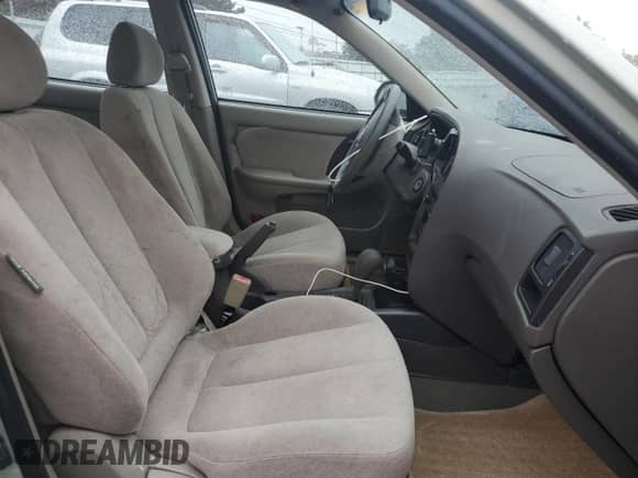 2004 Hyundai Elantra GLS with VIN KMHDN46D44U907025, listed as a Copart auction lot 85393735 with 90,065 mi miles and Salvage title. Bid and sale history available at DreamBid. Image 7.