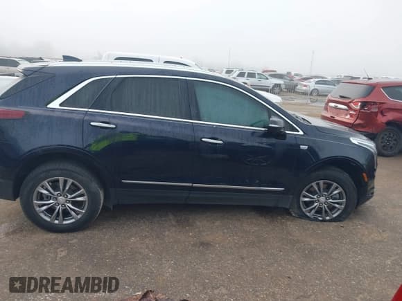 ✅ 2021 Cadillac XT5 FWD Premium Luxury • VIN: 1GYKNCRS2MZ185678 • Лот: 41143084. Опубликован ранее на IAAI с пробегом 25 399 миль. Бесплатный доступ к архиву аукционных продаж из США и подробный отчёт об истории автомобиля на DreamBid. Изображение 13.
