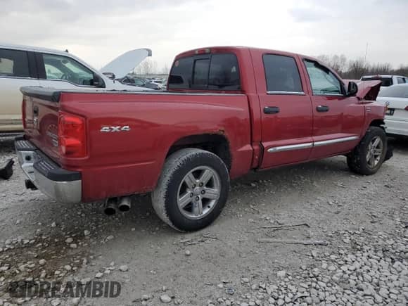 2010 Dodge Dakota Laramie z VIN 1D7RW5GP9AS217497, wystawiony jako Copart lot #84239104 z przebiegiem Nie podano mil oraz Czysty tytuł • Clean title. Historia ofert i sprzedaży dostępna na DreamBid. Obrazek 3.