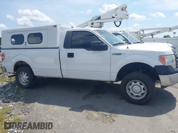 ✅ 2014 Ford F-150 XL • VIN: 1FTMF1EM9EKE58049 • Lot: 42549145. Listed on IAAI with 133,349 mi. Free auction sales archive from the USA and detailed vehicle history report at DreamBid. Image 13.