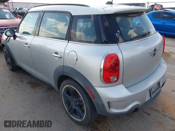 ✅ 2013 MINI Countryman S • VIN: WMWZC3C55DWP22474 • Lot: 42395575. Listed on IAAI with 87,220 mi. Free auction sales archive from the USA and detailed vehicle history report at DreamBid. Image 3.