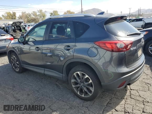 ✅ 2016 Mazda CX-5 Grand Touring • VIN: JM3KE2DY0G0774207 • Lot: 87041195. Listed on Copart with 188,809 mi. Free auction sales archive from the USA and detailed vehicle history report at DreamBid. Image 2.