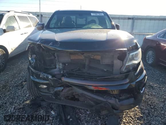 2018 Chevrolet Colorado 4WD Z71 with VIN 1GCHTDEN3J1169608, listed as a Copart auction lot 77887984 with 87,863 mi miles and Salvage title. Bid and sale history available at DreamBid. Image 5.