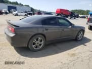 ✅ 2013 Dodge Charger RT Plus • VIN: 2C3CDXDT0DH575817 • Lot: 63104115. Listed on Copart with 183,737 mi. Free auction sales archive from the USA and detailed vehicle history report at DreamBid. Image 3.