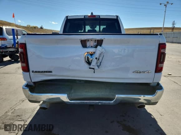 ✅ 2022 Ram 1500 Laramie • VIN: 1C6SRFJT6NN479116 • Lot: 87420175. Listed on Copart with 59,784 mi. Free auction sales archive from the USA and detailed vehicle history report at DreamBid. Image 6.