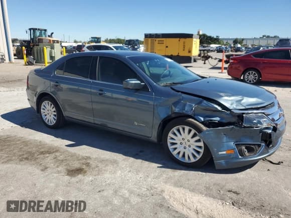 ✅ 2012 Ford Fusion Hybrid • VIN: 3FADP0L37CR243446 • Lot: 91114385. Wystawiony na Copart z przebiegiem 63 711 mil. Bezpłatny archiwum sprzedaży aukcyjnych z USA i szczegółowy raport historii pojazdu na DreamBid. Zdjęcie 4.