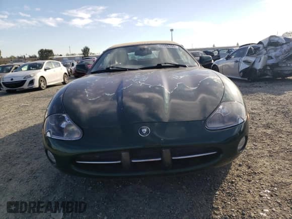 ✅ 2003 Jaguar XK • VIN: SAJDA42C232A31860 • Lot: 88586705. Wystawiony na Copart z przebiegiem 148 846 mil. Bezpłatny archiwum sprzedaży aukcyjnych z USA i szczegółowy raport historii pojazdu na DreamBid. Zdjęcie 5.