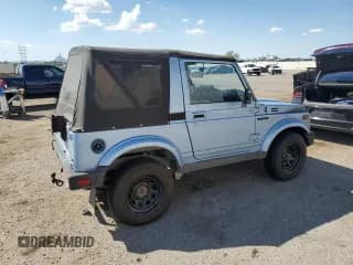 ✅ 1988 Suzuki Samurai • VIN: JS4JC51C2J4256018 • Lot: 81606735. Wystawiony na Copart z przebiegiem 91 755 mil. Bezpłatny archiwum sprzedaży aukcyjnych z USA i szczegółowy raport historii pojazdu na DreamBid. Zdjęcie 3.