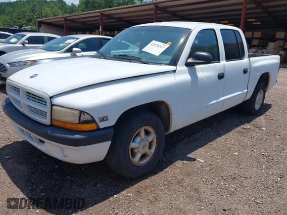 ✅ 2000 Dodge Dakota Sport • VIN: 1B7GL2AX1YS707993 • Lot: 42670217. Listed on IAAI with 172,037 mi. Free auction sales archive from the USA and detailed vehicle history report at DreamBid. Image 2.
