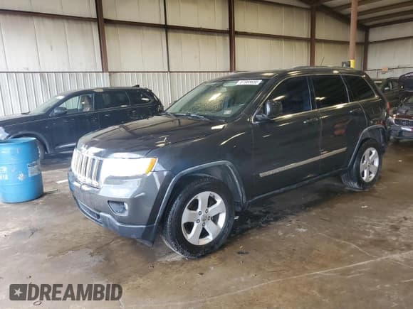 ✅ 2011 Jeep Grand Cherokee Laredo • VIN: 1J4RR4GG3BC714014 • Lot: 61985655. Listed on Copart with 178,044 mi. Free auction sales archive from the USA and detailed vehicle history report at DreamBid. Image 1.
