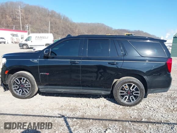 ✅ 2021 GMC Yukon AT4 • VIN: 1GKS2CKD6MR154142 • Lot: 41854543. Listed on IAAI with 72,121 mi. Free auction sales archive from the USA and detailed vehicle history report at DreamBid. Image 14.