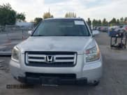 ✅ 2006 Honda Pilot EX-L • VIN: 2HKYF18566H558647 • Lot: 43633483. Listed on IAAI with 203,447 mi. Free auction sales archive from the USA and detailed vehicle history report at DreamBid. Image 13.