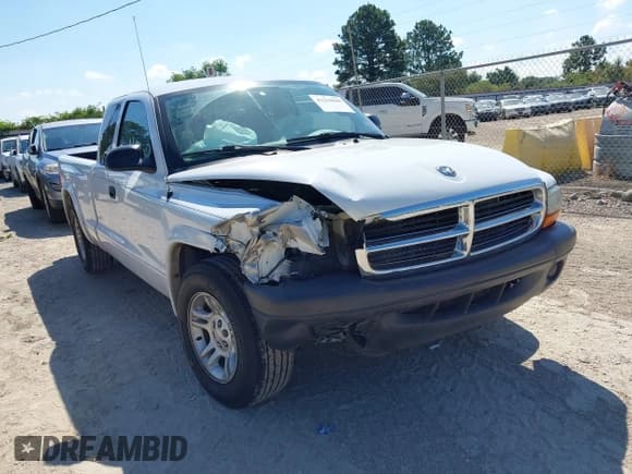 ✅ 2004 Dodge Dakota • VIN: 1D7GL12K84S698366 • Lot: 43250040. Listed on IAAI with 127,799 mi. Free auction sales archive from the USA and detailed vehicle history report at DreamBid. Image 1.