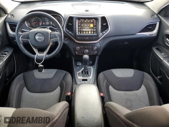 ✅ 2014 Jeep Cherokee Altitude • VIN: 1C4PJMCS4EW296144 • Lot: 45006155. Listed on Copart with 106,411 mi. Free auction sales archive from the USA and detailed vehicle history report at DreamBid. Image 8.