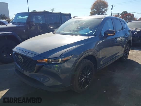 ✅ 2025 Mazda CX-5 S Carbon Edition • VIN: JM3KFBCMXS0673275 • Лот: 43696570. Опубликован ранее на IAAI с пробегом 16 756 миль. Бесплатный доступ к архиву аукционных продаж из США и подробный отчёт об истории автомобиля на DreamBid. Изображение 2.