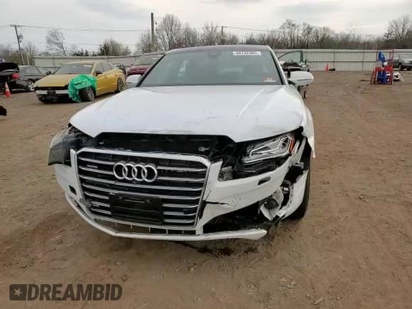 ✅ 2015 Audi A8 3.0T • VIN: WAU3GAFDXFN016904 • Лот: 40732383. Опубликован ранее на Copart с пробегом 99 889 миль. Бесплатный доступ к архиву аукционных продаж из США и подробный отчёт об истории автомобиля на DreamBid. Изображение 11.