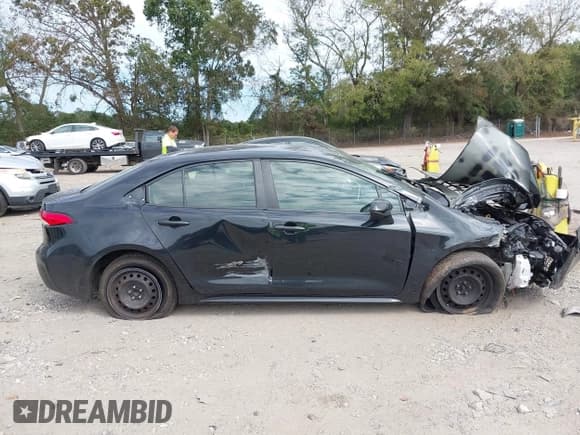 ✅ 2021 Toyota Corolla LE • VIN: JTDEPMAE7MJ127492 • Lot: 43417558. Listed on IAAI with 39,884 mi. Free auction sales archive from the USA and detailed vehicle history report at DreamBid. Image 13.
