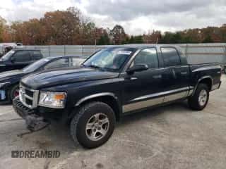 2008 Dodge Dakota SLT с VIN 1D7HW48KX8S594178, выставлен на аукционе Copart как лот 77591894 с пробегом 191 262 миль миль и Списание • Salvage title. История ставок и продаж доступна на DreamBid. Изображение 1.