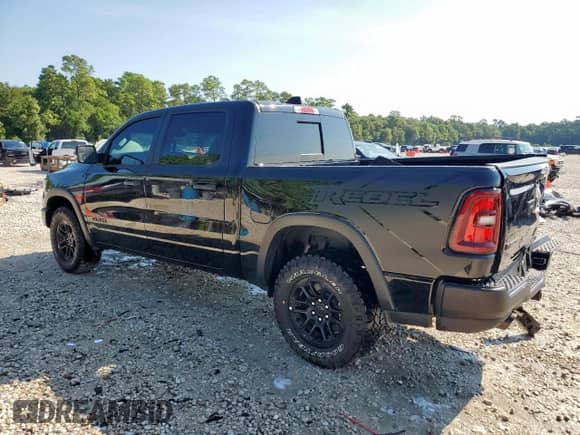 2025 Ram 1500 Rebel z VIN 1C6SRFLP0SN633704, wystawiony jako Copart lot #70535985 z przebiegiem 7 886 mil mil oraz Czysty tytuł • Clean title. Historia ofert i sprzedaży dostępna na DreamBid. Obrazek 2.