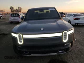 ✅ 2022 Rivian R1T Launch Edition • VIN: 7FCTGAAL4NN003060 • Lot: 82446374. Listed on Copart with 24,532 mi. Free auction sales archive from the USA and detailed vehicle history report at DreamBid. Image 5.