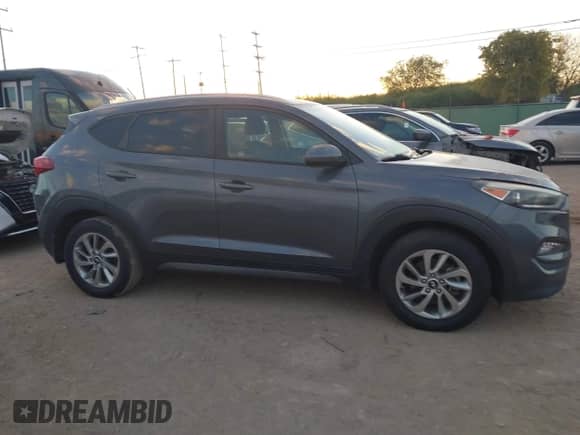 2016 Hyundai Tucson SE z VIN KM8J33A46GU235712, wystawiony jako IAAI lot #43602206 z przebiegiem 88 238 mil mil oraz . Historia ofert i sprzedaży dostępna na DreamBid. Obrazek 13.