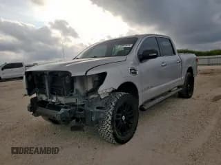 ✅ 2017 Nissan Titan S • VIN: 1N6AA1EK1HN521953 • Lot: 93061575. Listed on Copart with 121,927 mi. Free auction sales archive from the USA and detailed vehicle history report at DreamBid. Image 1.