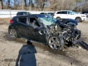 ✅ 2015 Hyundai Veloster Turbo • VIN: KMHTC6AE7FU233713 • Lot: 86824904. Wystawiony na Copart z przebiegiem Nie podano. Bezpłatny archiwum sprzedaży aukcyjnych z USA i szczegółowy raport historii pojazdu na DreamBid. Zdjęcie 4.