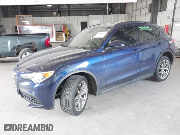 ✅ 2018 Alfa Romeo Stelvio Ti Sport • VIN: ZASFAKNN1J7B81973 • Lot: 42800512. Wystawiony na IAAI z przebiegiem 91 075 mil. Bezpłatny archiwum sprzedaży aukcyjnych z USA i szczegółowy raport historii pojazdu na DreamBid. Zdjęcie 2.