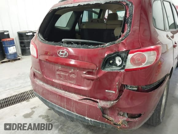 ✅ 2012 Hyundai Santa Fe GLS • VIN: 5XYZGDAG4CG135583 • Lot: 41305409. Listed on IAAI with 155,944 mi. Free auction sales archive from the USA and detailed vehicle history report at DreamBid. Image 6.