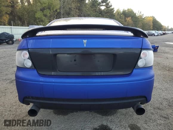 ✅ 2005 Pontiac GTO • VIN: 6G2VX12UX5L383689 • Lot: 82034024. Listed on Copart with 146,972 mi. Free auction sales archive from the USA and detailed vehicle history report at DreamBid. Image 6.