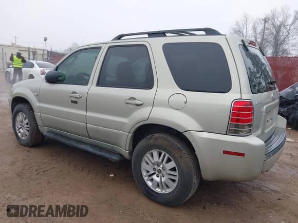 2005 Mercury Mariner Luxury z VIN 4M2YU56175DJ10333, wystawiony jako IAAI lot #41644749 z przebiegiem 174 477 mil mil oraz . Historia ofert i sprzedaży dostępna na DreamBid. Obrazek 3.