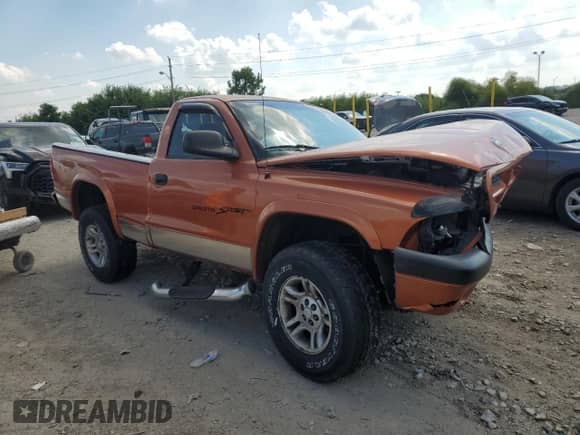 2001 Dodge Dakota Sport z VIN 1B7GG26N31S197440, wystawiony jako Copart lot #68280665 z przebiegiem Nie podano mil oraz Szkoda całkowita • Salvage title. Historia ofert i sprzedaży dostępna na DreamBid. Obrazek 4.