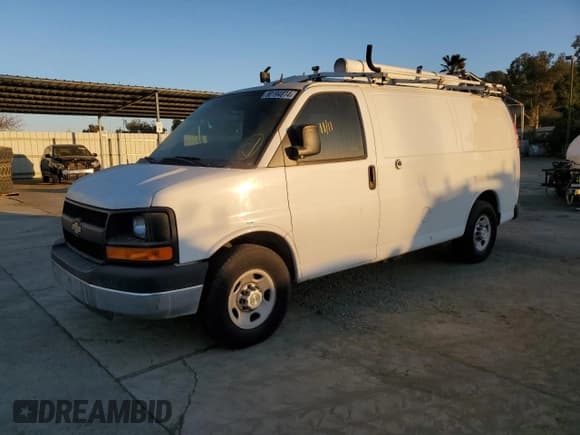✅ 2014 Chevrolet Express Cargo • VIN: 1GCWGFCB0E1122350 • Lot: 58278045. Listed on Copart with 99,593 mi. Free auction sales archive from the USA and detailed vehicle history report at DreamBid. Image 1.