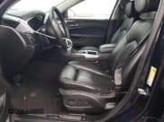 ✅ 2016 Cadillac SRX Luxury Collection • VIN: 3GYFNEE32GS540927 • Lot: 91419665. Wystawiony na Copart z przebiegiem 141 469 mil. Bezpłatny archiwum sprzedaży aukcyjnych z USA i szczegółowy raport historii pojazdu na DreamBid. Zdjęcie 7.